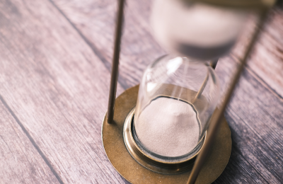 Hour glass with sand falling. 